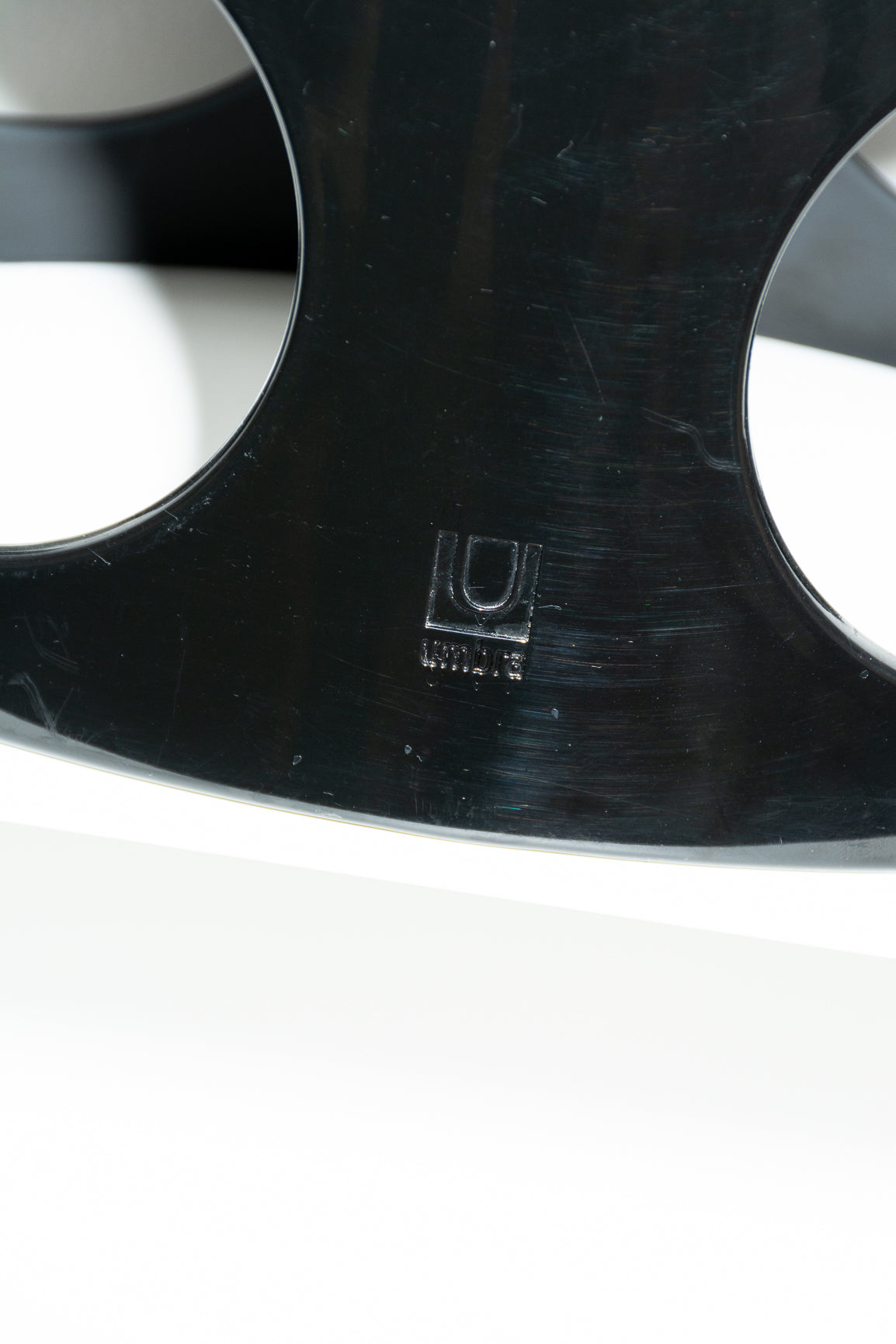 Black plastic vintage Umbra wine holder designed by Ran Lerner