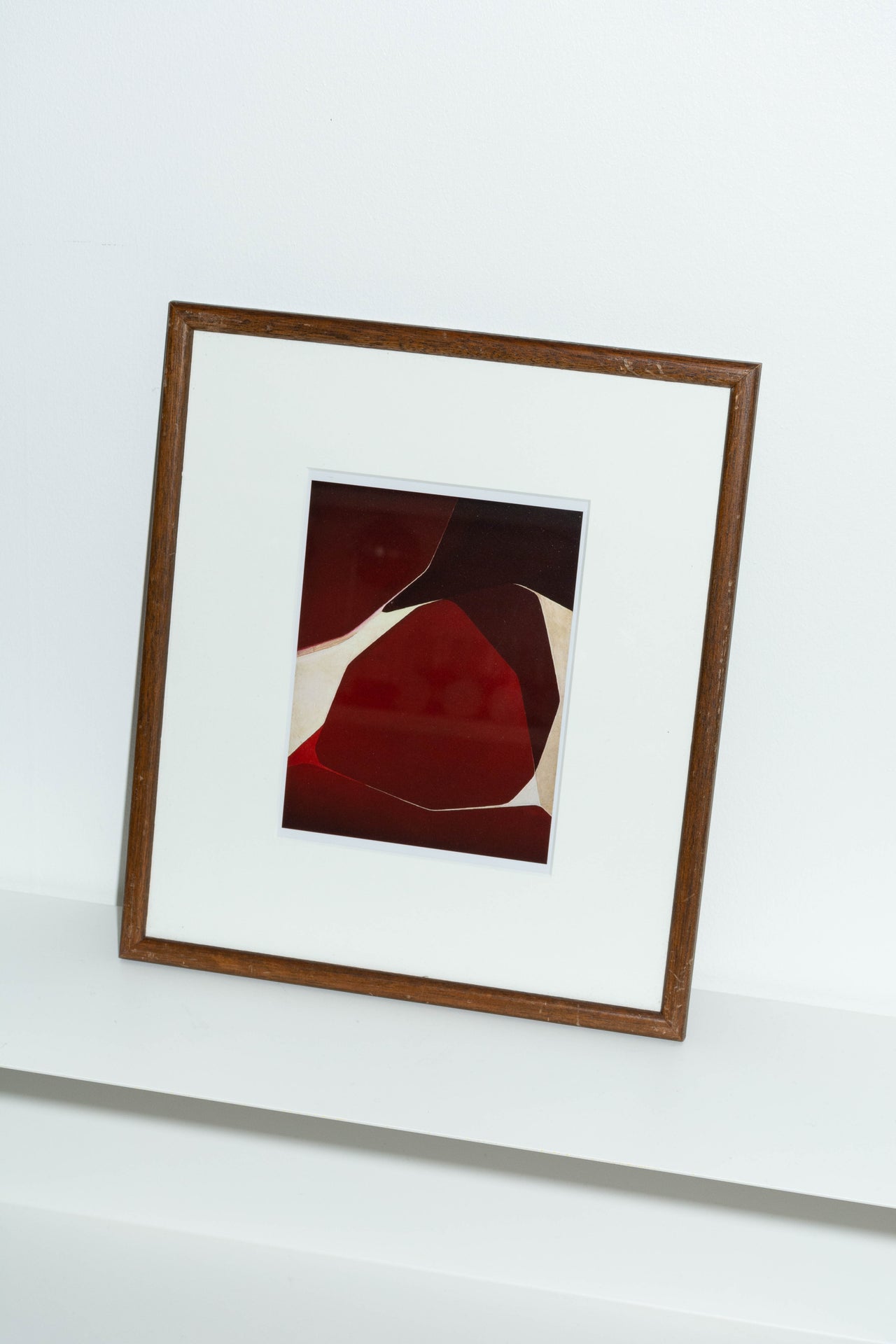 Red tone print in vintage wooden frame