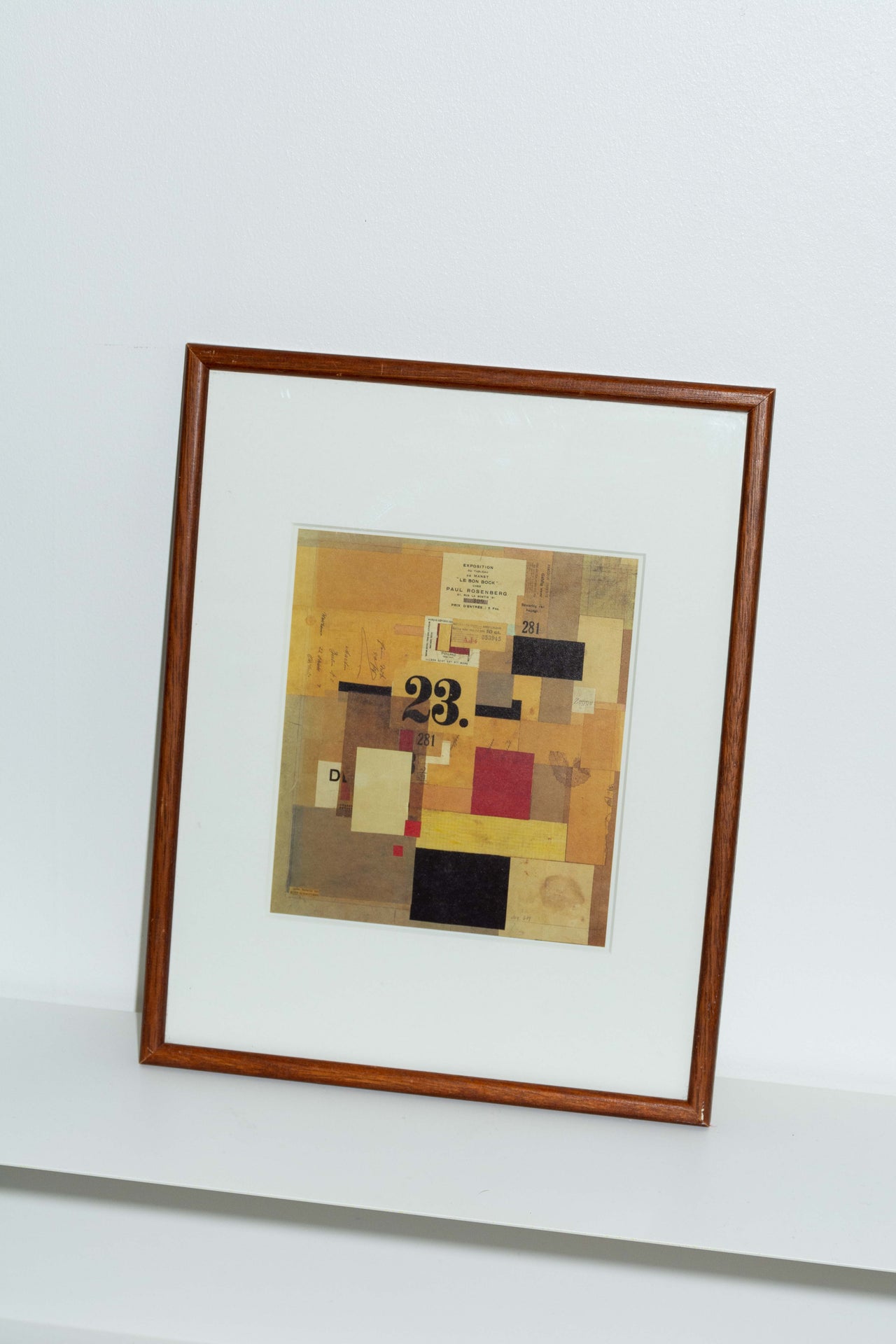 Vintage wooden frame with Kurt Schwitter print