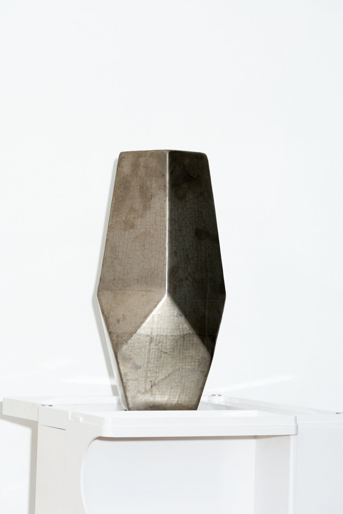 Large brutalist faceted metallic vase