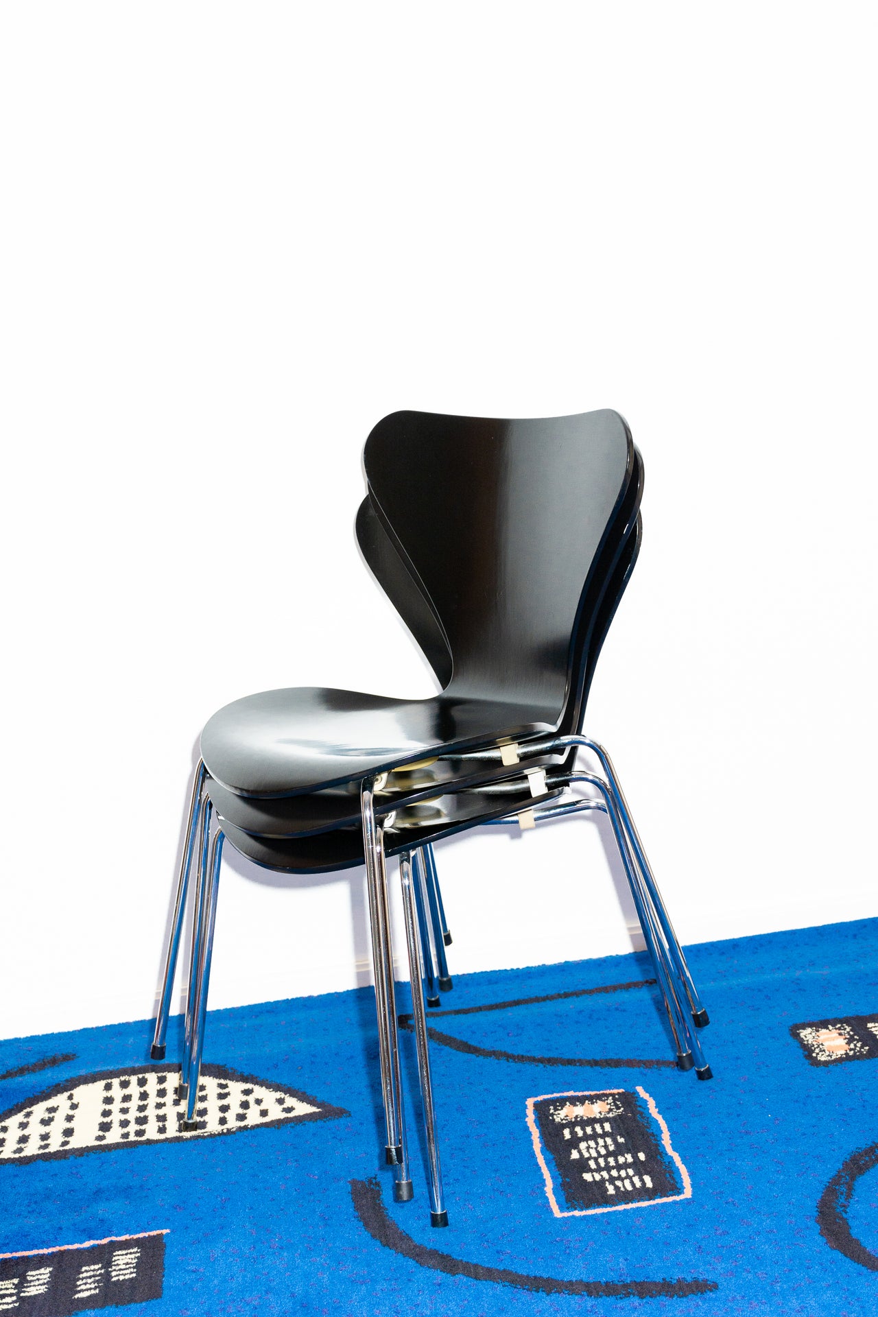 Black bent plywood and chrome vintage designer chairs