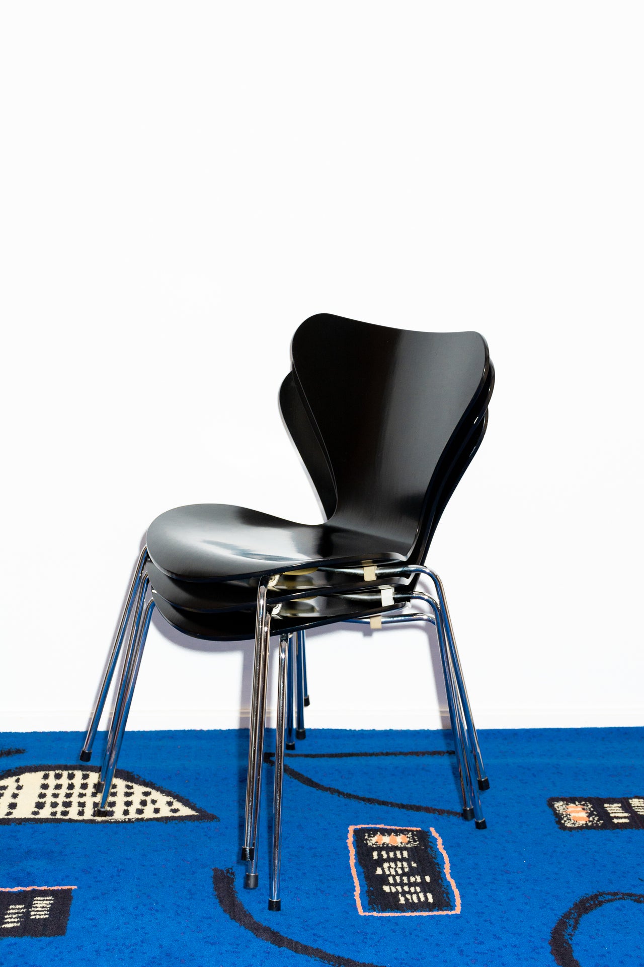 Black bent plywood and chrome vintage designer chairs