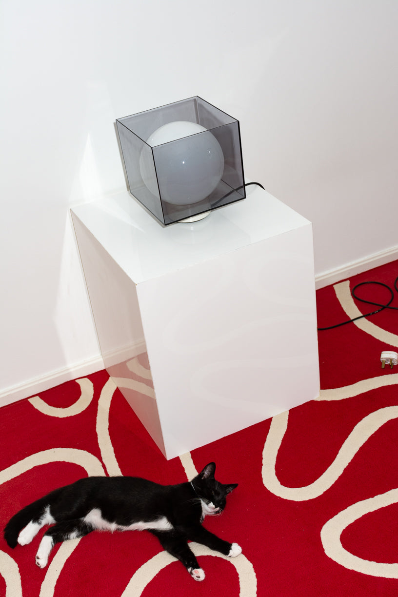 Perspex cube with inner orb lam