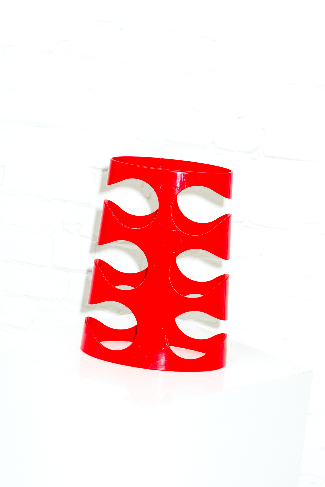 Red Umbra Bottle Rack Designed by Ran Lerner