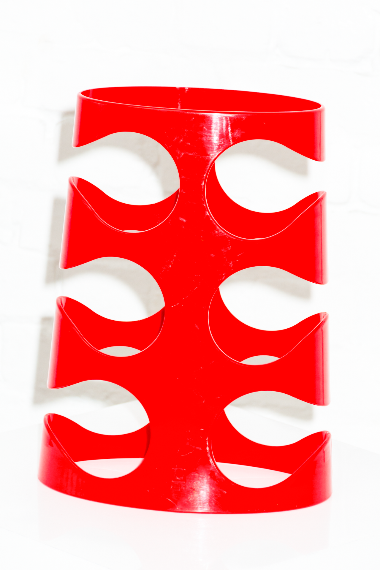 Red Umbra Bottle Rack Designed by Ran Lerner