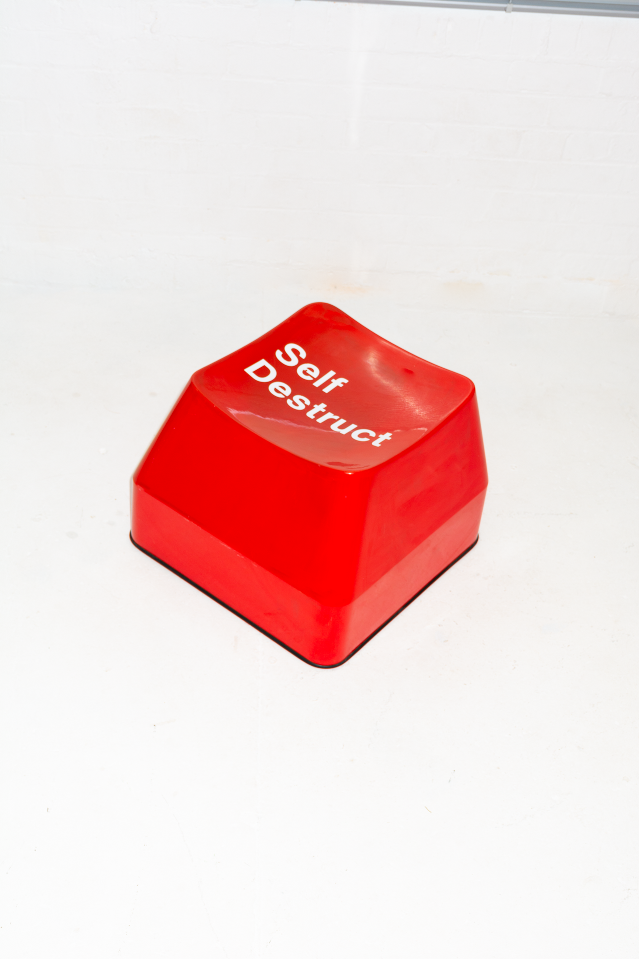 Red 'Self Destruct' Fibreglass stool/chair