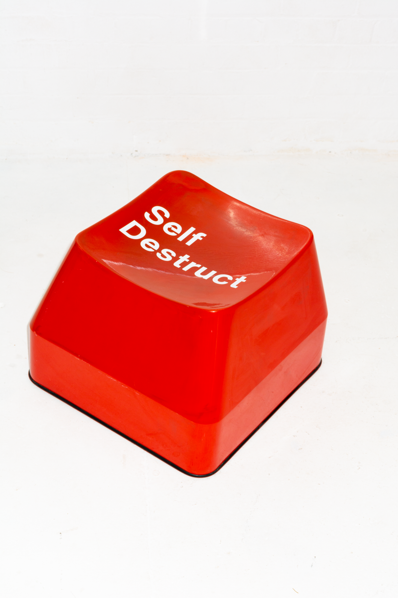 Red 'Self Destruct' Fibreglass stool/chair