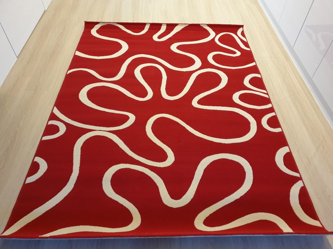 Red and off-white stripe pattern rug